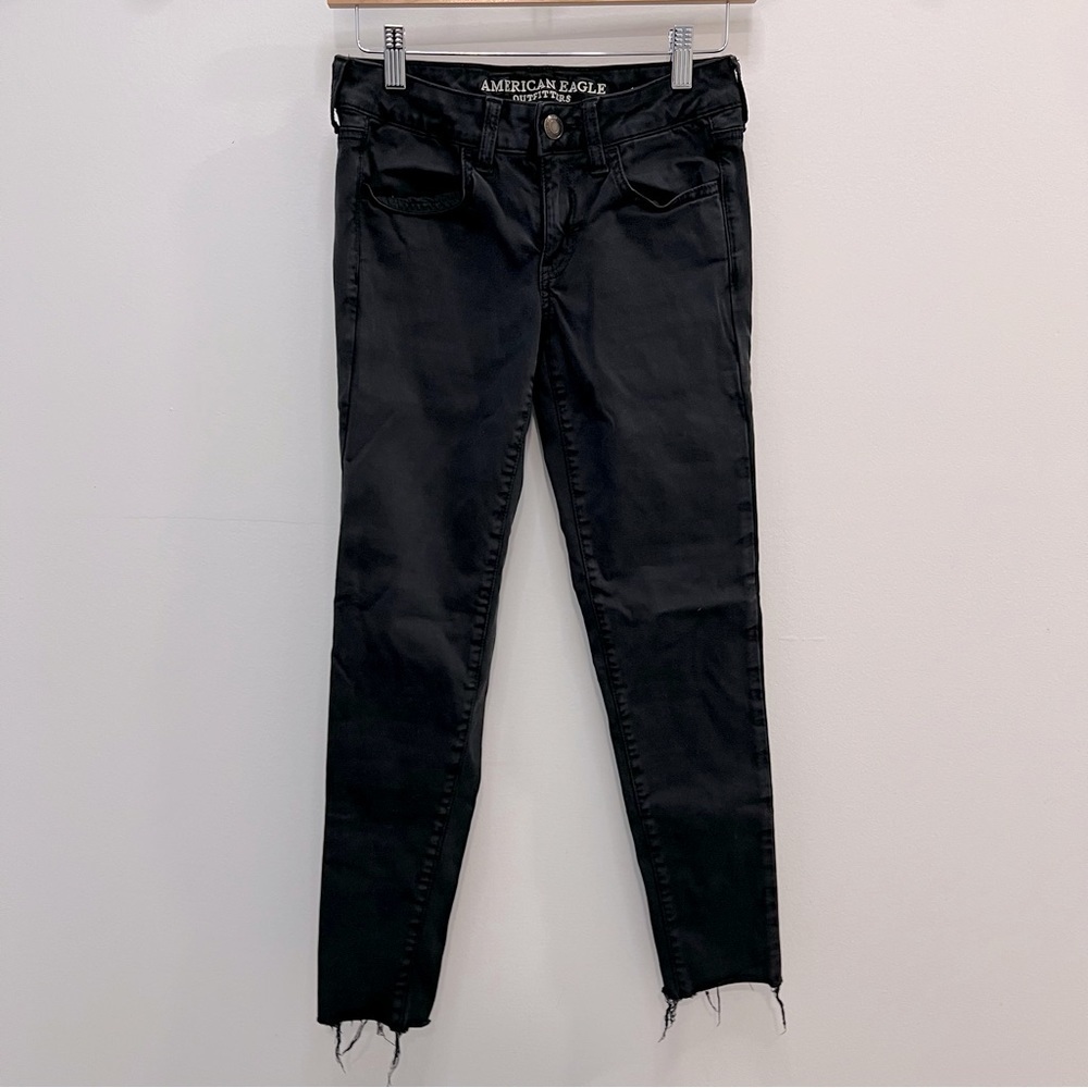 American eagle super stretch black jeans with frayed ankles